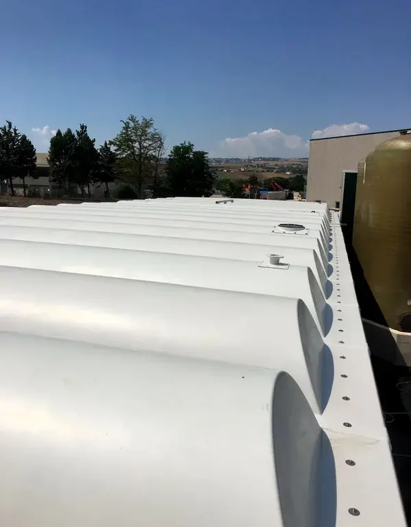 Coperture a tegoli per vasche rettangolari